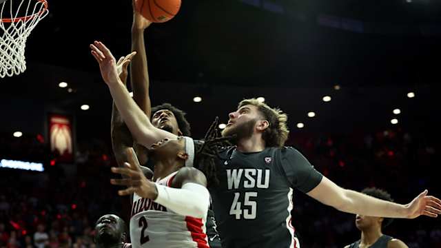Washington State Cougars forward Isaac Jones (13) blocks a shot from Arizona Wildcats guard Caleb Love (2) during the second half at McKale Center.